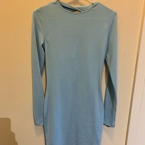 Kittenish light blue bodycon dress.